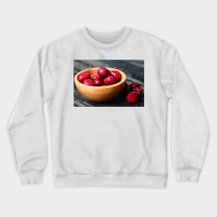A bowl of cherries. Crewneck Sweatshirt